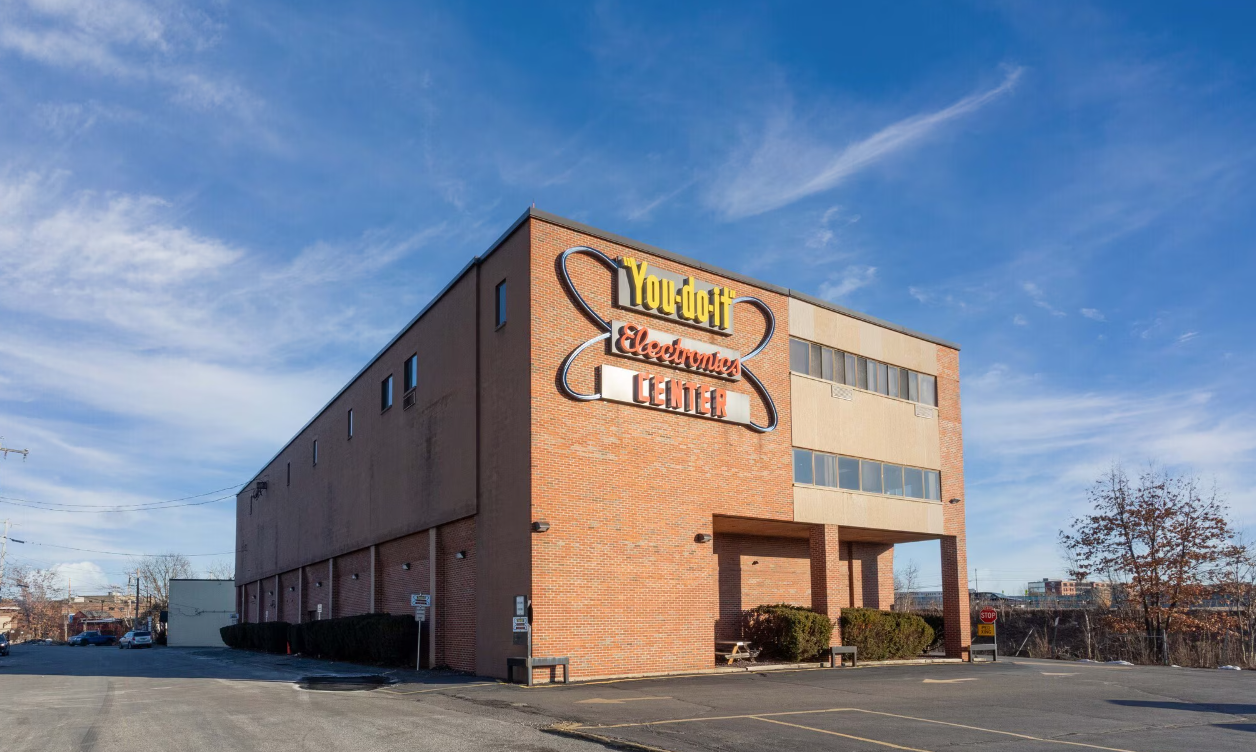 You-Do-It Electronics building in Needham before redevelopment